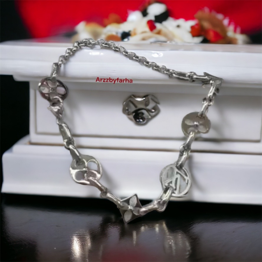 Silver Toned Charm Bracelet