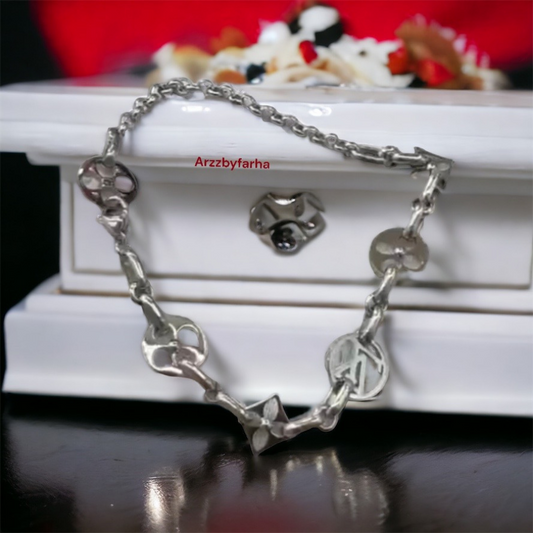 Silver Toned Charm Bracelet