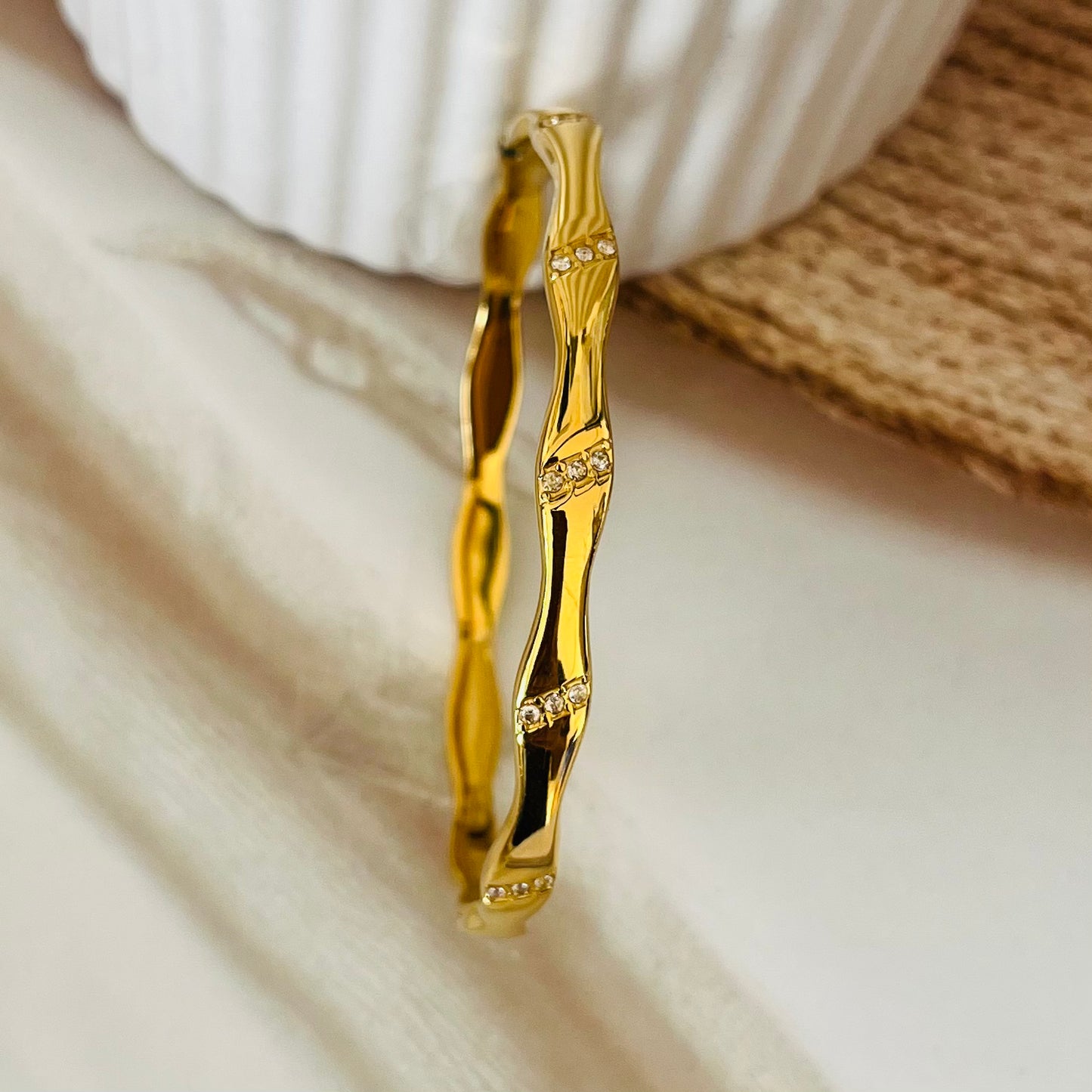 AD Studded Curve Bangle Bracelet