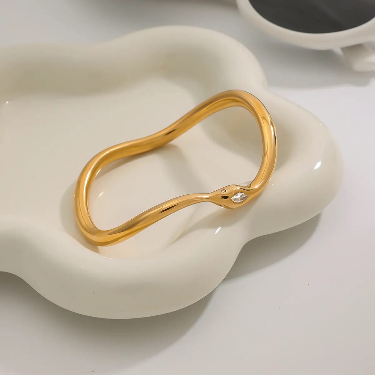 Solid Gold Wavy Bangle