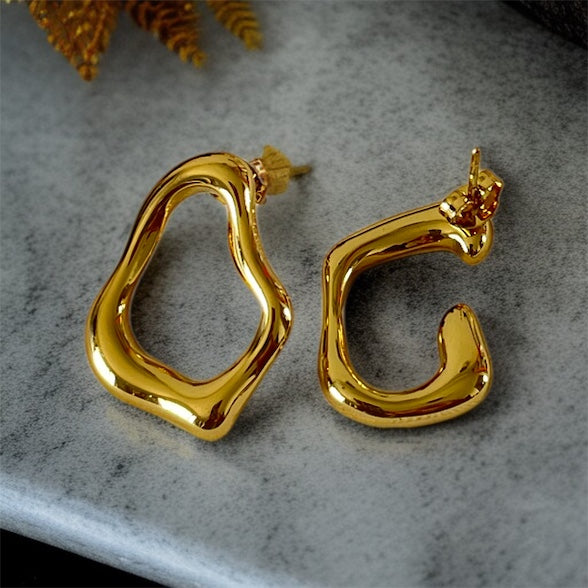 Gold Mismatched Studs Earrings