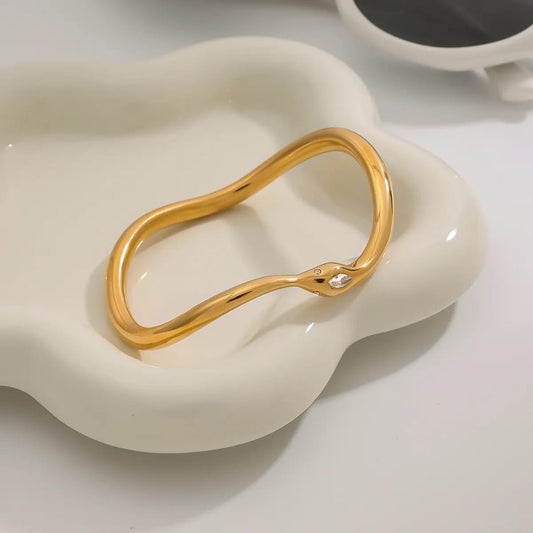 Solid Gold Wavy Bangle