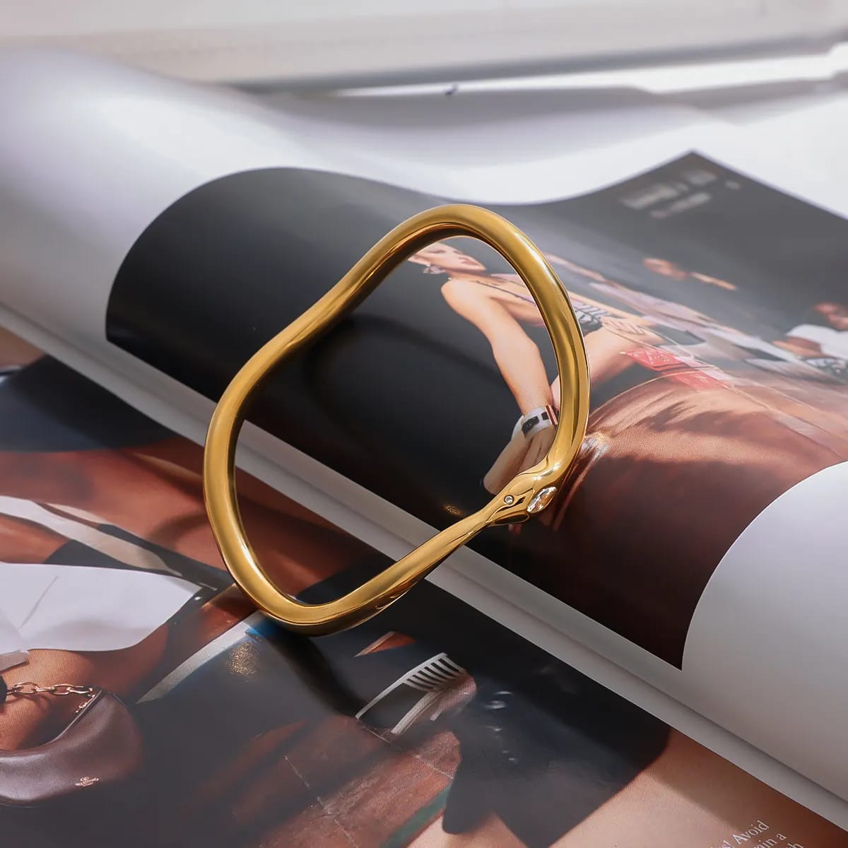 Solid Gold Wavy Bangle